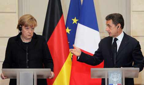 A. Merkel y N. Sarkozy, en París, dic. 2011