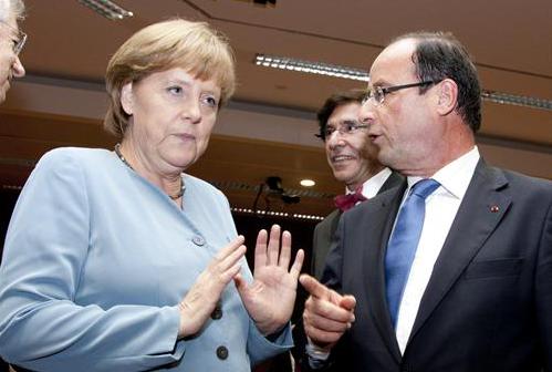 Hollande y Merkel en la cena informal del Consejo Europeo