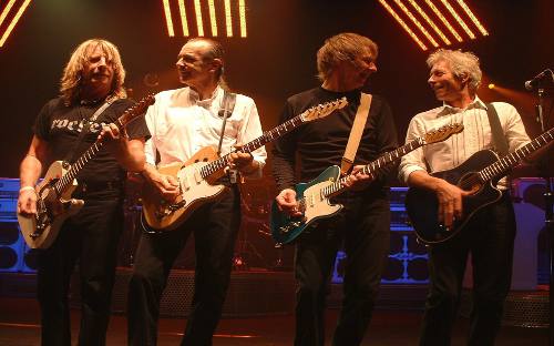 Componentes del grupo musical Status Quo en 2005