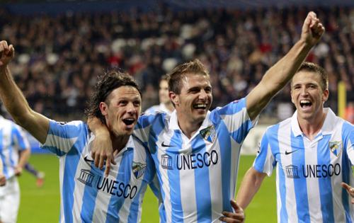 Jugadores del Málaga celebran su victoria ante el Anderlecht