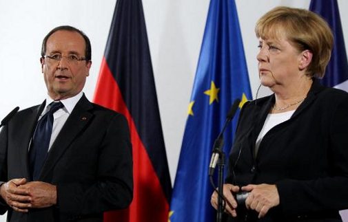 Hollande y Merkel ante los micrófonos y como distanciados