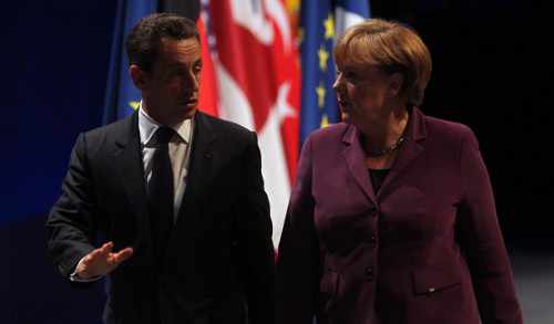 Merkel y Sarkozy, en la cumbre de Cannes