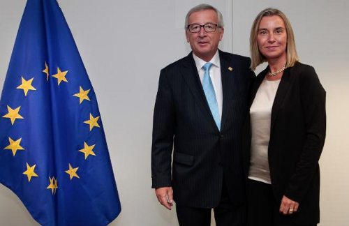 Jean-Claude Juncker y Federica Mogherini