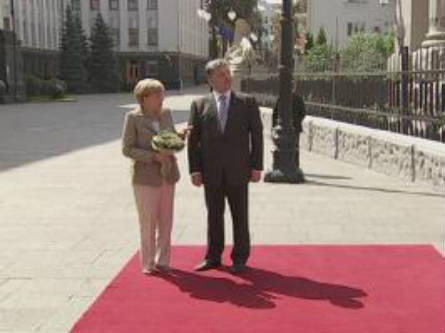 Poroshenko y Merkel en Kiev