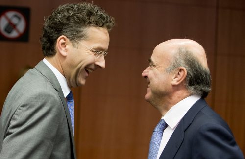 Jeroen Dijsselbloem y Luis de Guindos, ríen